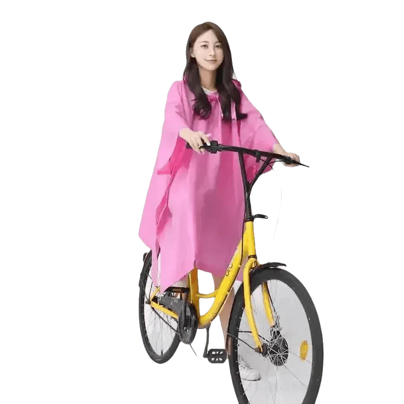 Woman in Colorful Waterproof Long Raincoat on Yellow Bicycle - GiFTiFY