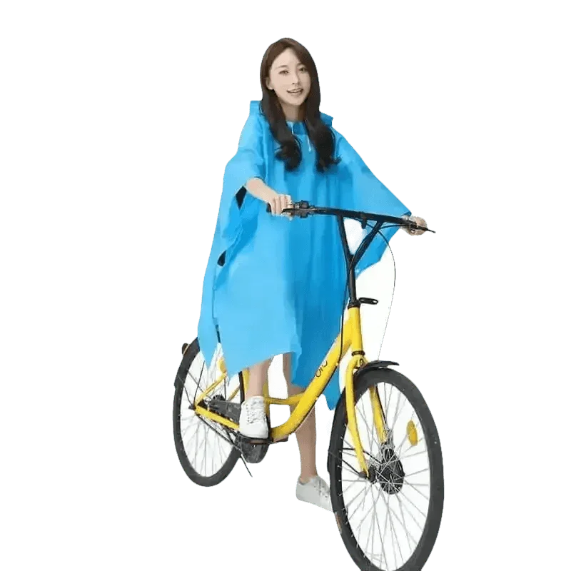 Woman in Colorful Waterproof Long Raincoat on Yellow Bicycle - GiFTiFY