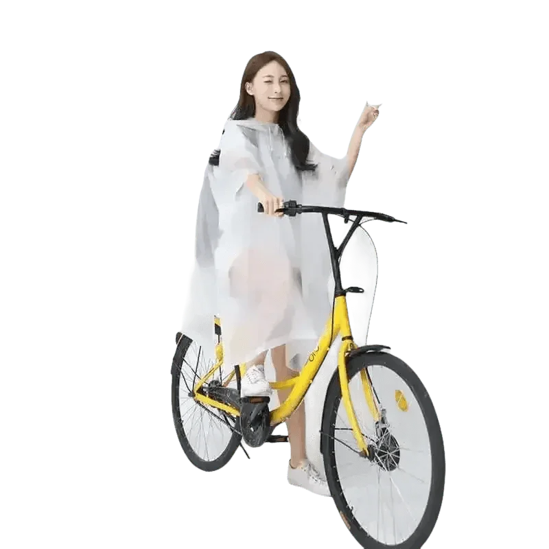 Woman in Colorful Waterproof Long Raincoat on Yellow Bicycle - GiFTiFY