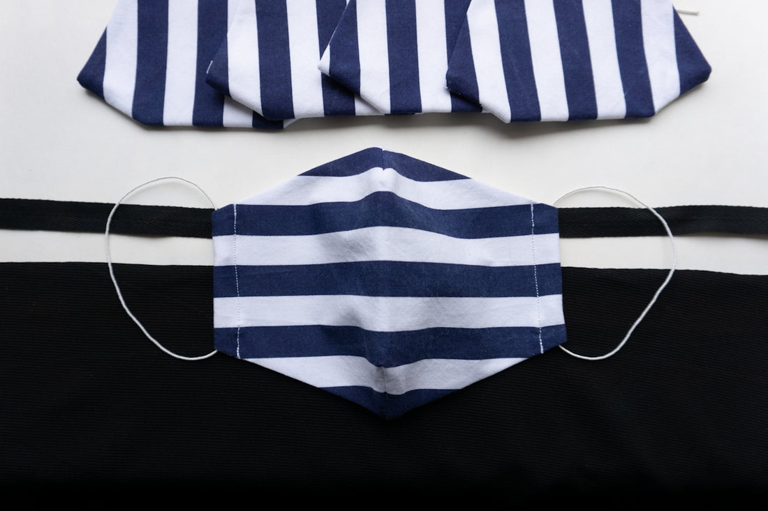white and blue striped textile