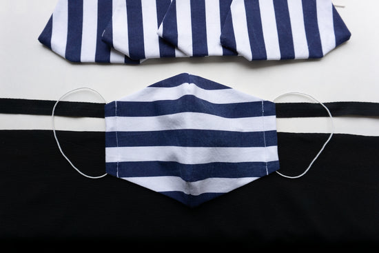 white and blue striped textile