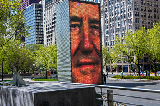 a large picture of a man on the side of a building