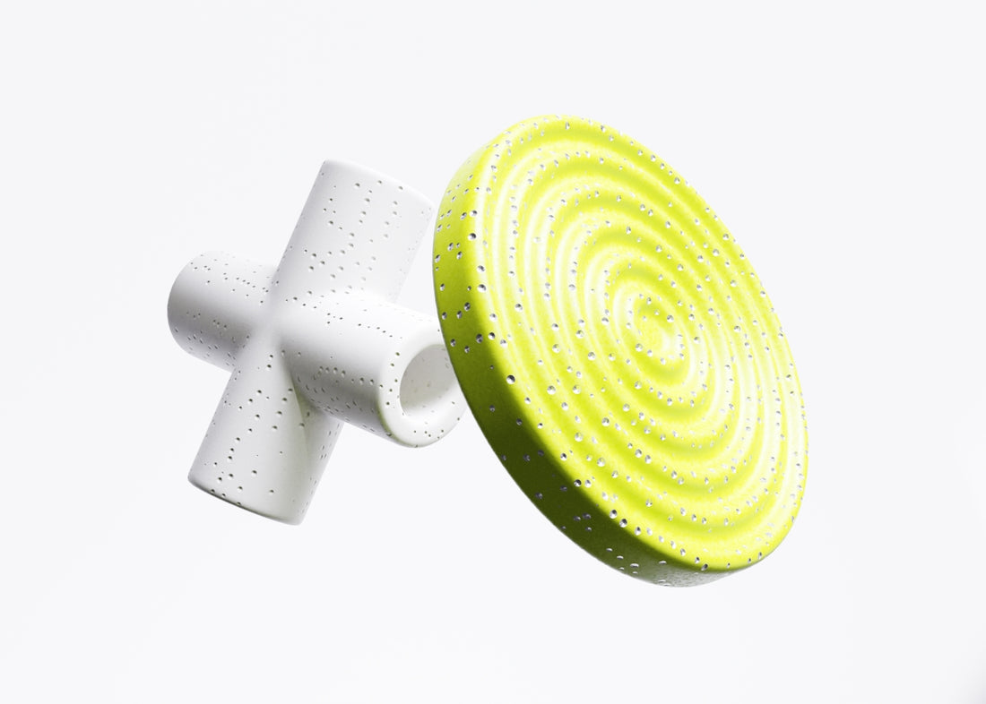 a yellow and white object flying through the air