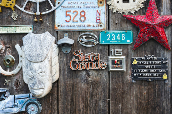 a bunch of assorted items on a wooden surface