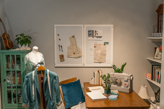 a room with a sewing machine and a table