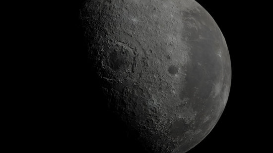 a close up of the moon with a black background
