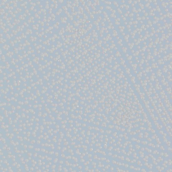 a blue and white background with small white dots