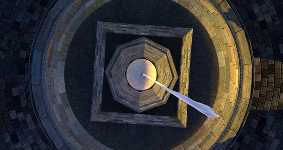 An aerial view of a circular object with a white object in the center