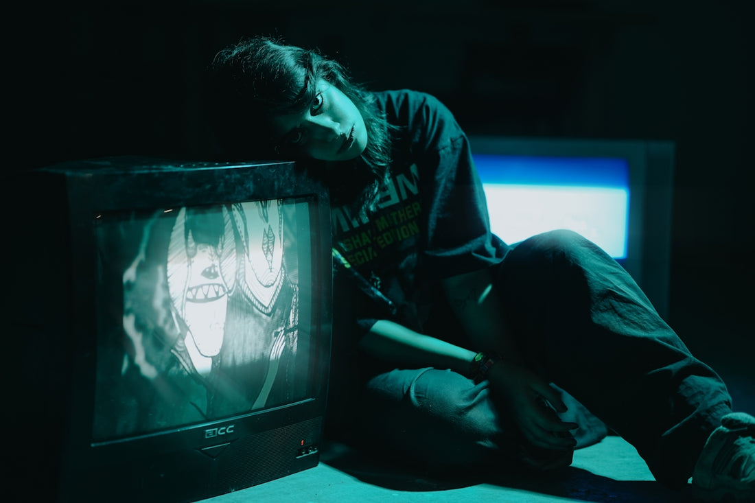Woman leans on vintage television with static screen