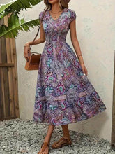 Plus Size Printed V-Neck Short Sleeve Midi Dress women Attire by Trendsi