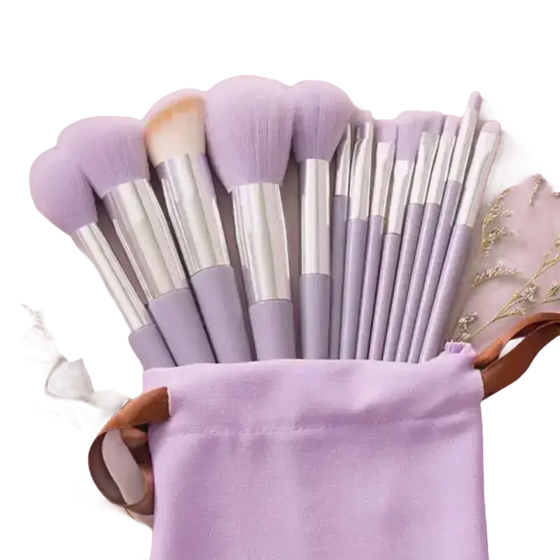 Makeup brush set in a lavender bag.