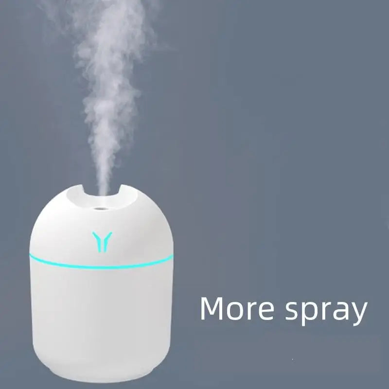 250ML USB Mini Air Humidifier releasing mist, ideal for aromatherapy and improving air quality.