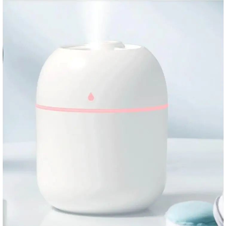 250ML USB Mini Air Humidifier Aroma Essential Oil Diffuser with LED light and mist function.
