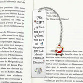 A stainless steel pendant bookmark about Christmas, the warmest Christmas reading gift for loved ones on Christmas Eve.