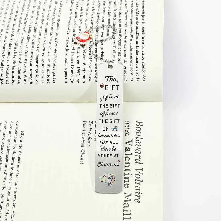 A stainless steel pendant bookmark about Christmas, the warmest Christmas reading gift for loved ones on Christmas Eve.