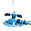 Blue Rotating Garden Sprinklers Watering Grass - GiFTiFY
