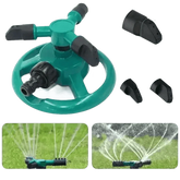 Blue Rotating Garden Sprinklers Watering Grass - GiFTiFY