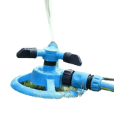 Blue Rotating Garden Sprinklers Watering Grass - GiFTiFY