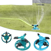 Blue Rotating Garden Sprinklers Watering Grass - GiFTiFY