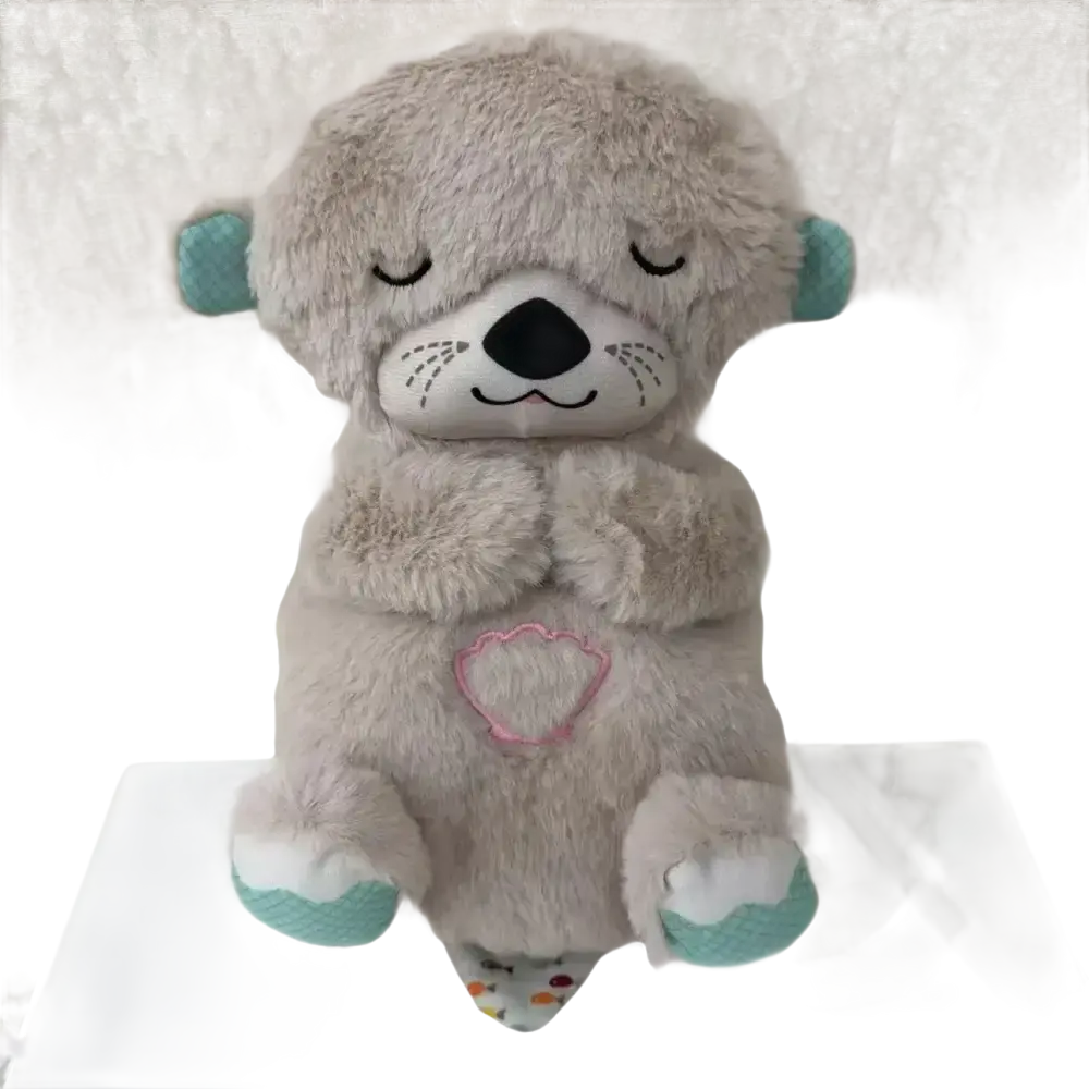 Gray plush otter toy with closed eyes.