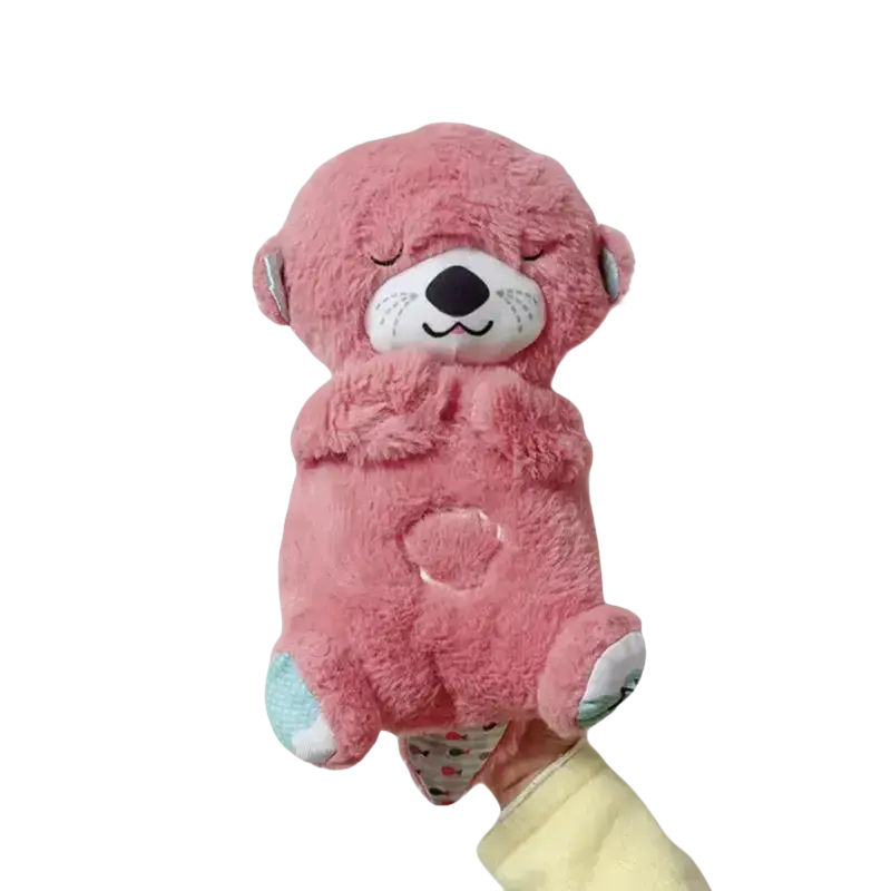 Pink plush otter toy.