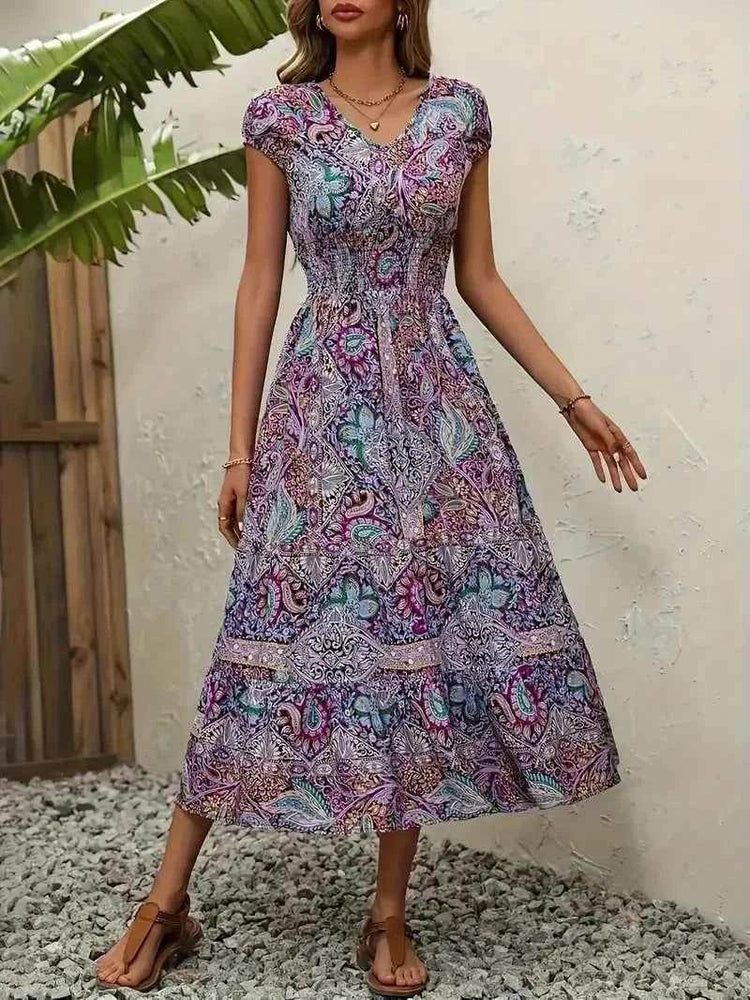Plus Size Printed V-Neck Short Sleeve Midi Dress women Attire by Trendsi
