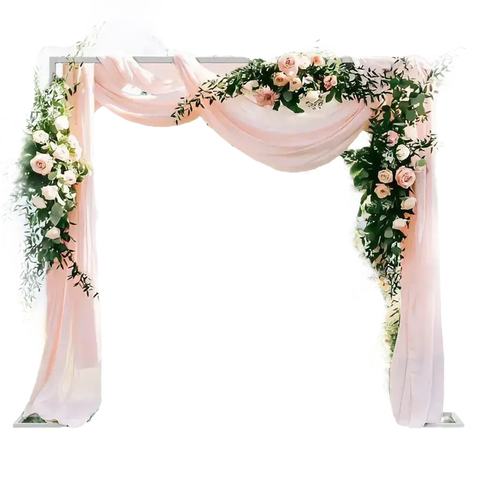 Wedding arch with pink fabric and floral arrangements.
