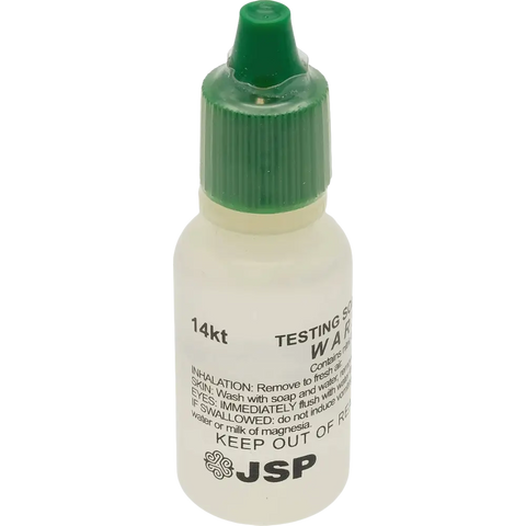 Small bottle with green cap.