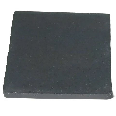 Square, dark, textured tile.