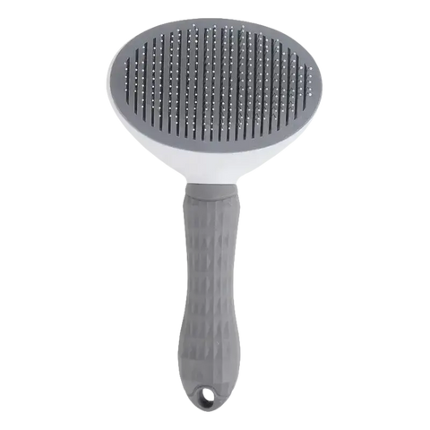Gray and white pet grooming brush.