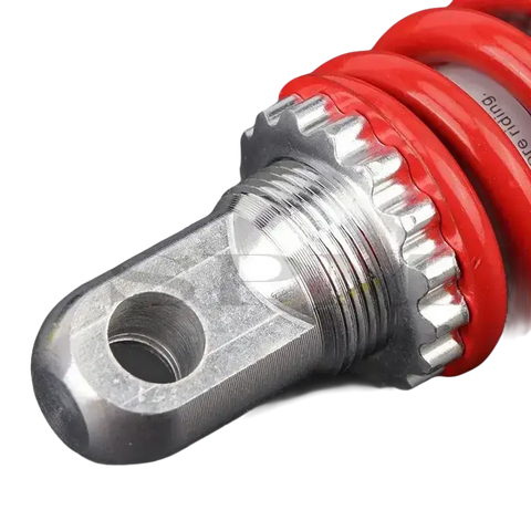 Red and silver motorcycle shock absorber.