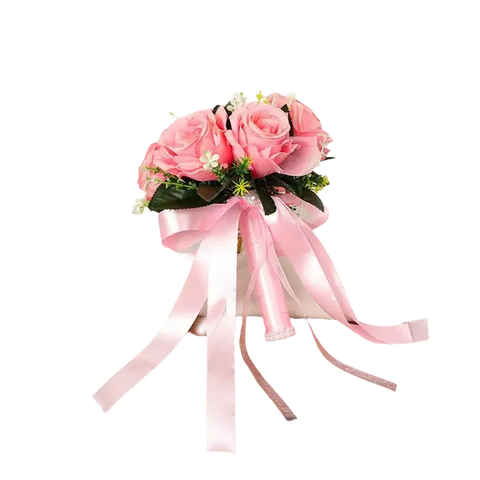 Pink rose bouquet with ribbons.