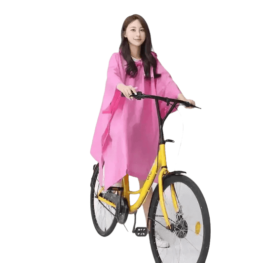 Woman in Colorful Waterproof Long Raincoat on Yellow Bicycle - GiFTiFY
