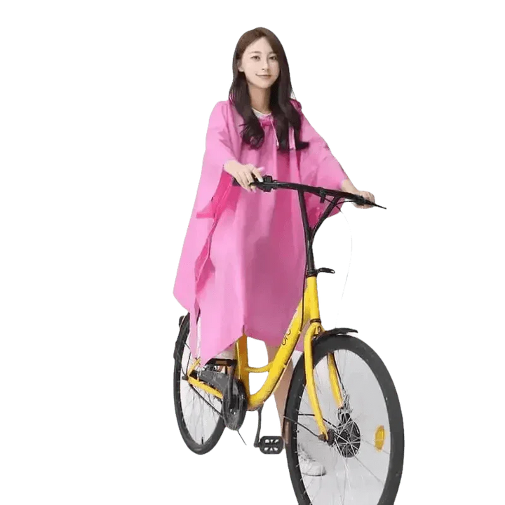 Woman in Colorful Waterproof Long Raincoat on Yellow Bicycle - GiFTiFY
