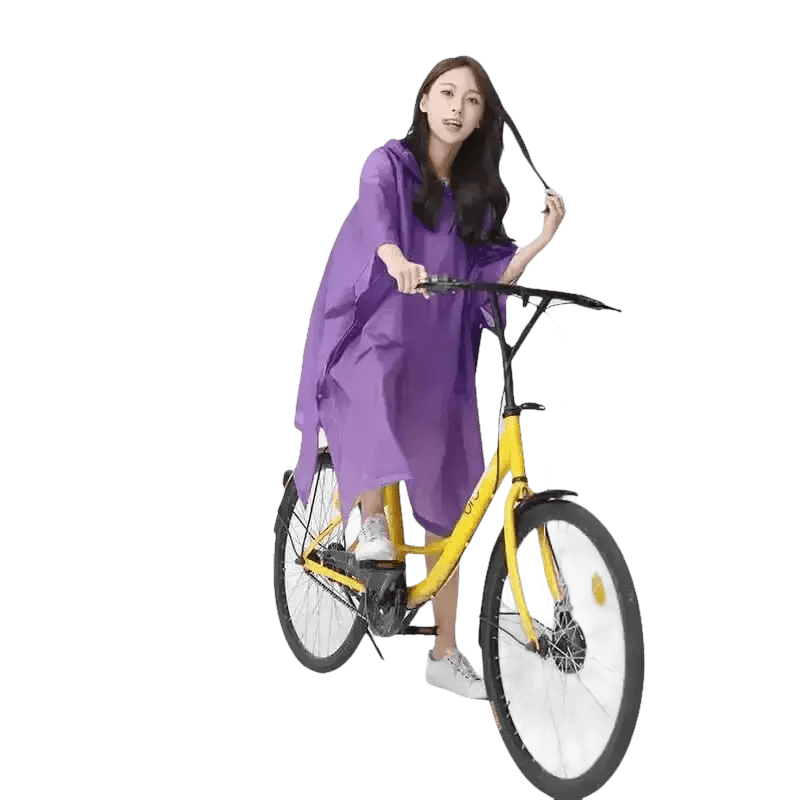 Woman in Colorful Waterproof Long Raincoat on Yellow Bicycle - GiFTiFY