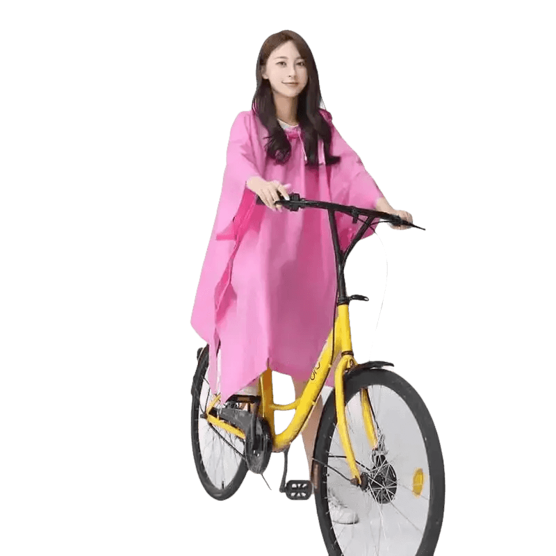 Woman in Colorful Waterproof Long Raincoat on Yellow Bicycle - GiFTiFY