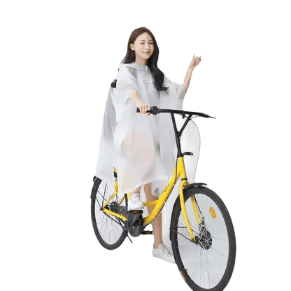 Woman in Colorful Waterproof Long Raincoat on Yellow Bicycle - GiFTiFY