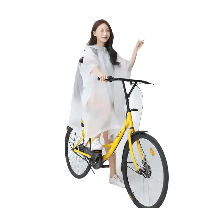 Woman in Colorful Waterproof Long Raincoat on Yellow Bicycle - GiFTiFY
